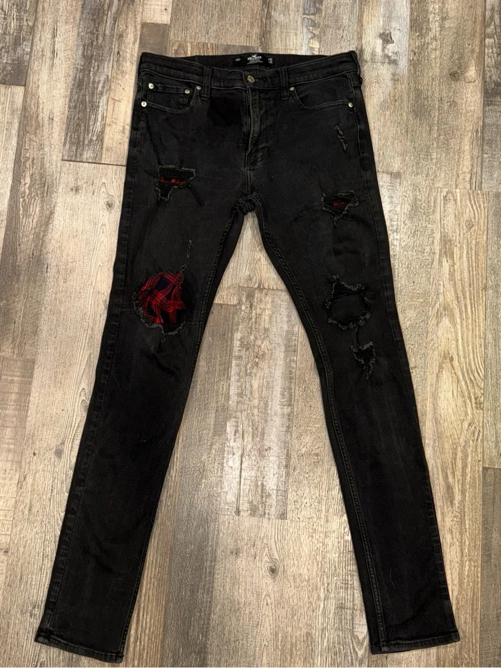 Men’s Hollister Black Stacked Skinny Jeans with Red Plaid Patch